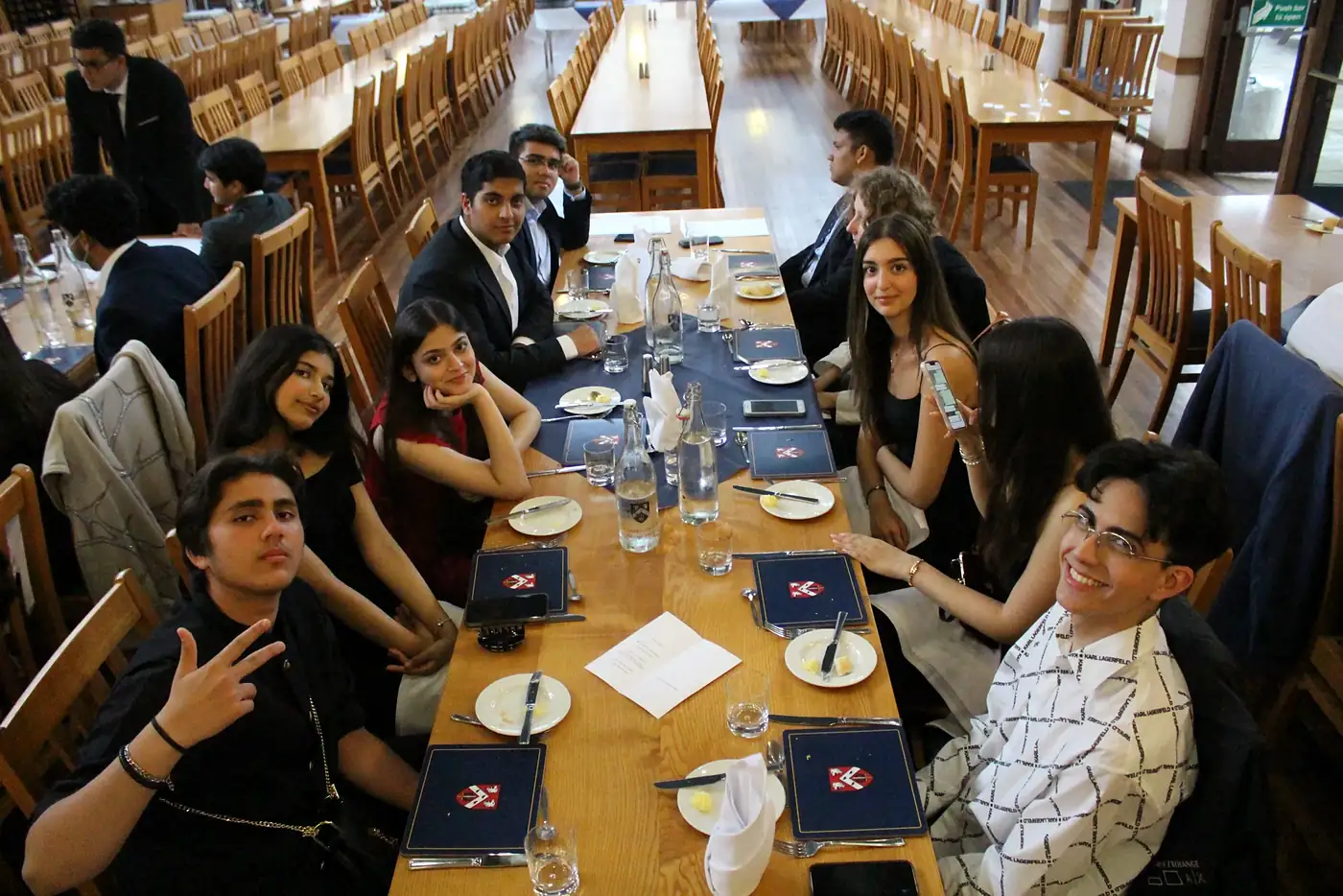 Students at a formal dinner in an Oxford college